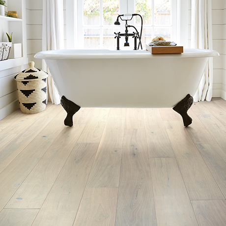 standalone bathtub on waterproof flooring